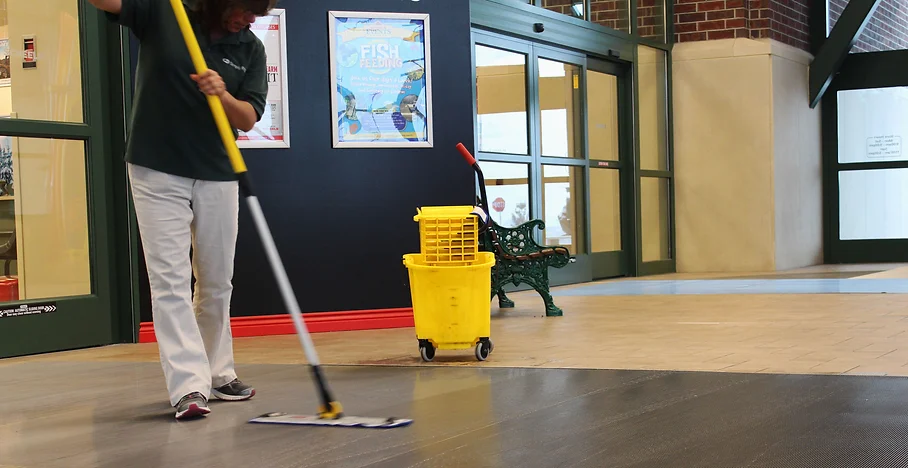 man cleaning a carpet